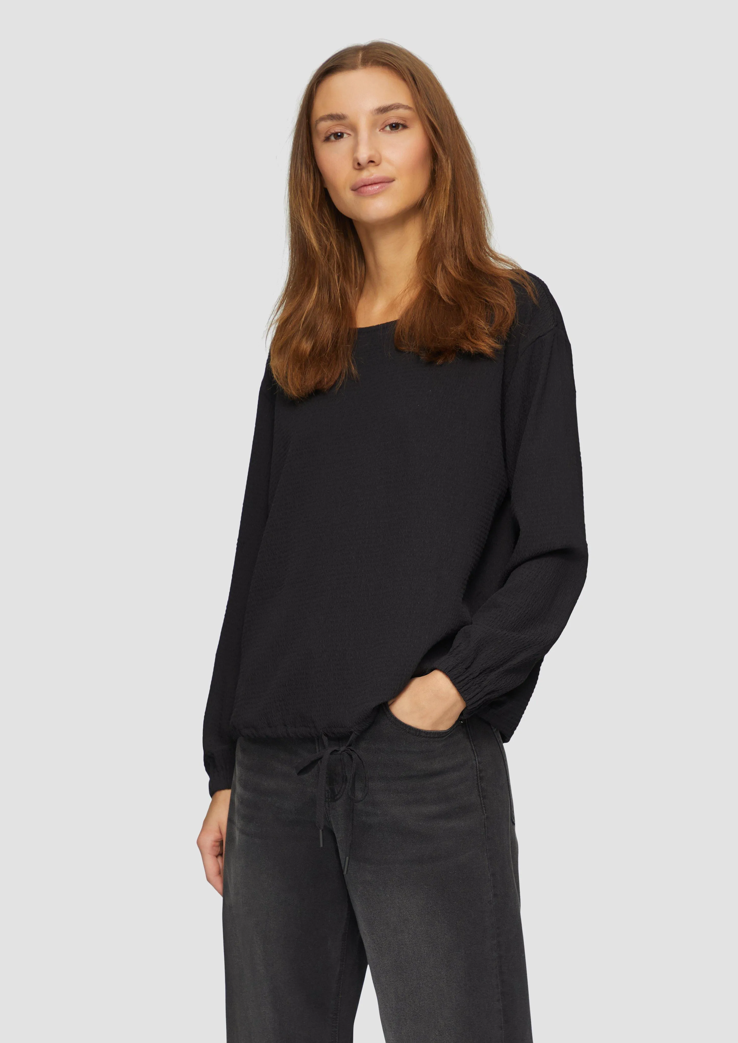 Blouse with dropped shoulders and a drawstring